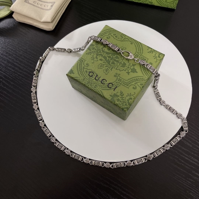 G*u*i necklaces